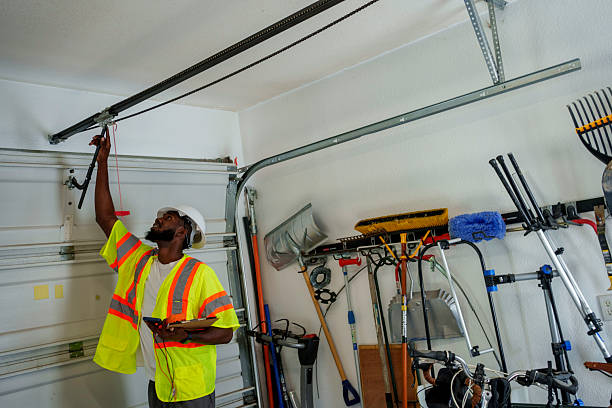 Professional Garage Door Panel Replacement technician working in Waterloo, IA